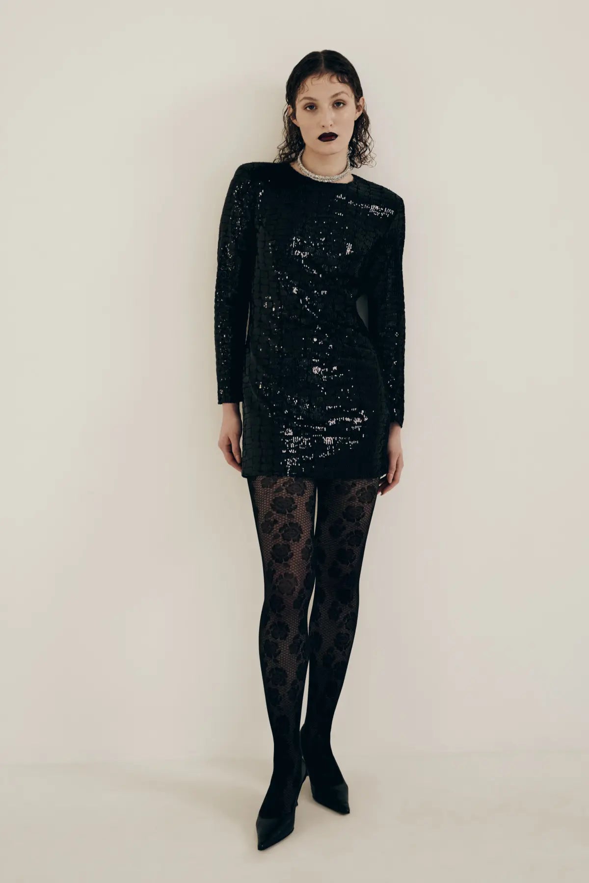 black sequin dress with black tights The perfect little black dress for every occasion and my secret weapon tights that hold it all together, via @saks #sakspartner #saks , Comment SHOP below to receive a DM with the link to this post on